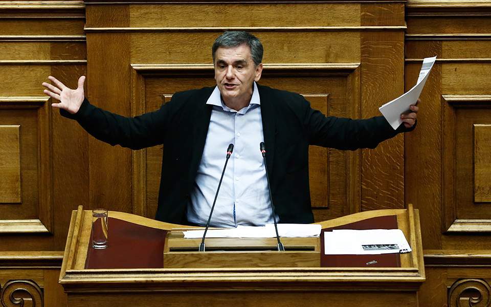 Greece wants to repay loans to lenders before maturity, Tsakalotos says ...