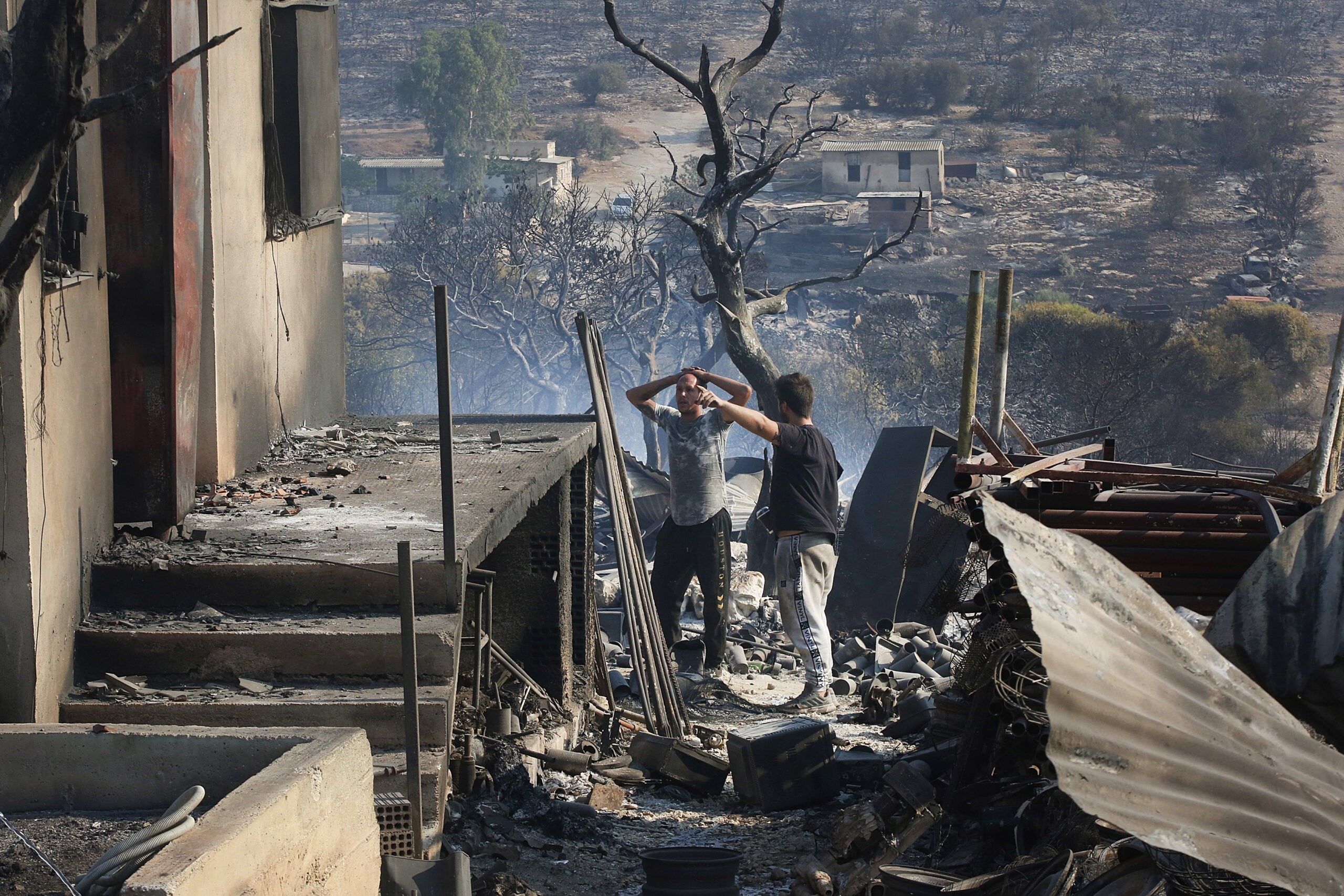 Wildfires in Greece raze forests, spur evacuations; allies send aid