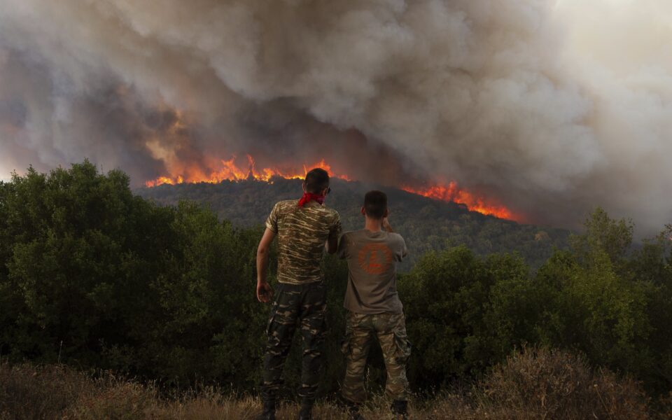 Firefighters in Greece struggle to control wildfires, including the EU’s largest blaze on record