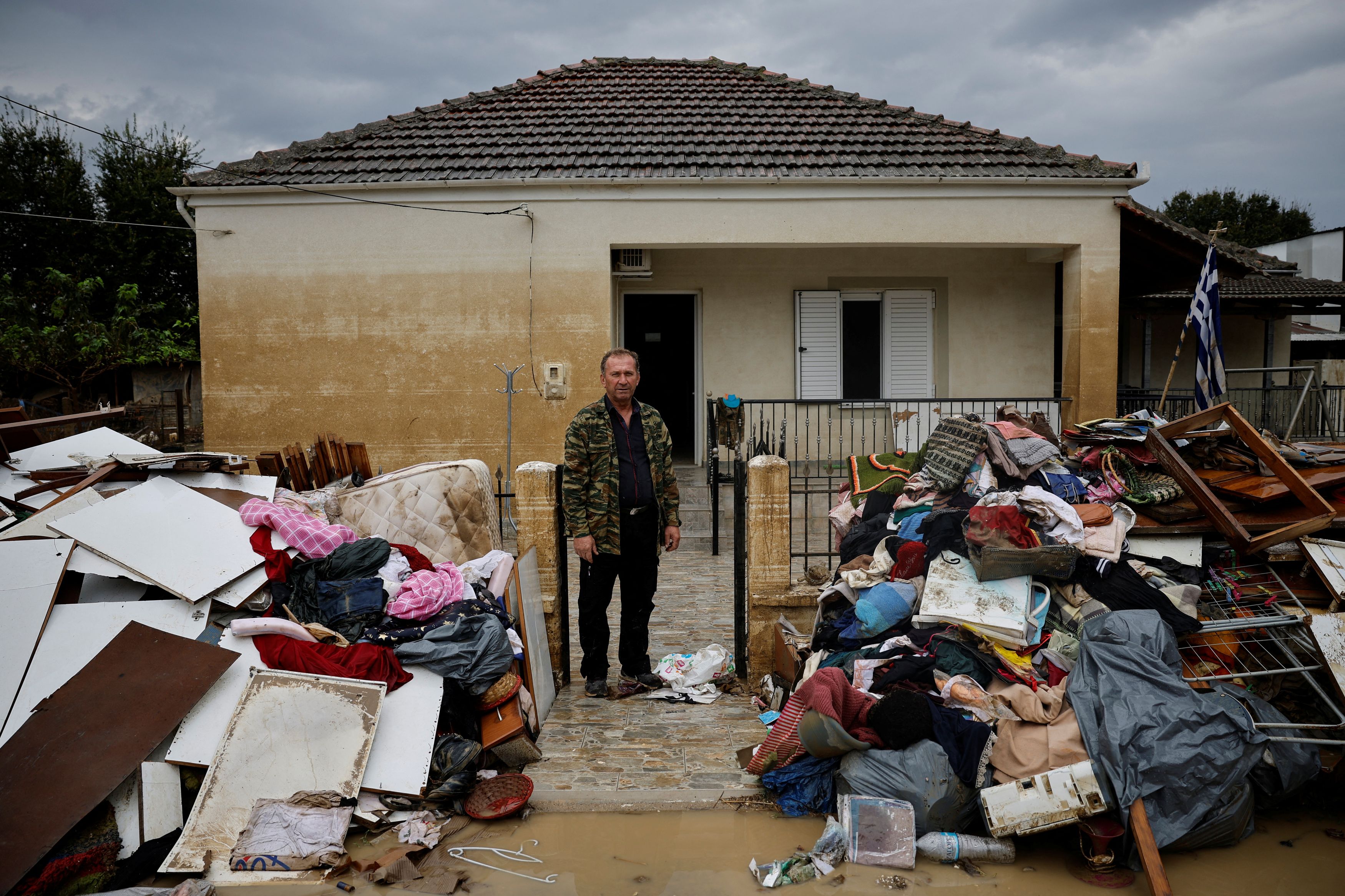 lifetime-of-memories-ruined-in-flooded-greek-village-of-metamorfosi1