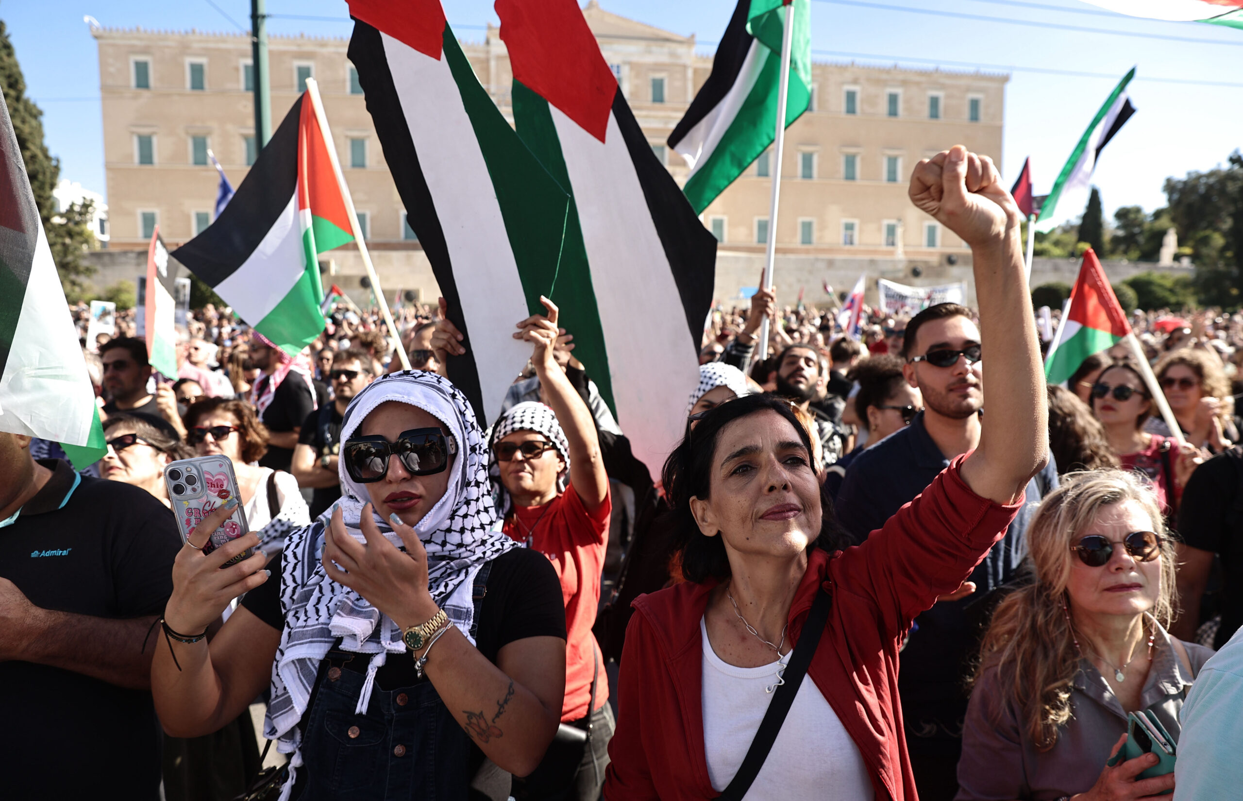 Palestinian ambassador greets crowds during solidarity rally in Athens ...