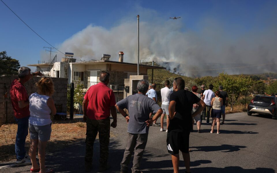 Greek wildfire spreads to edge of Athens; towns, hospitals evacuated