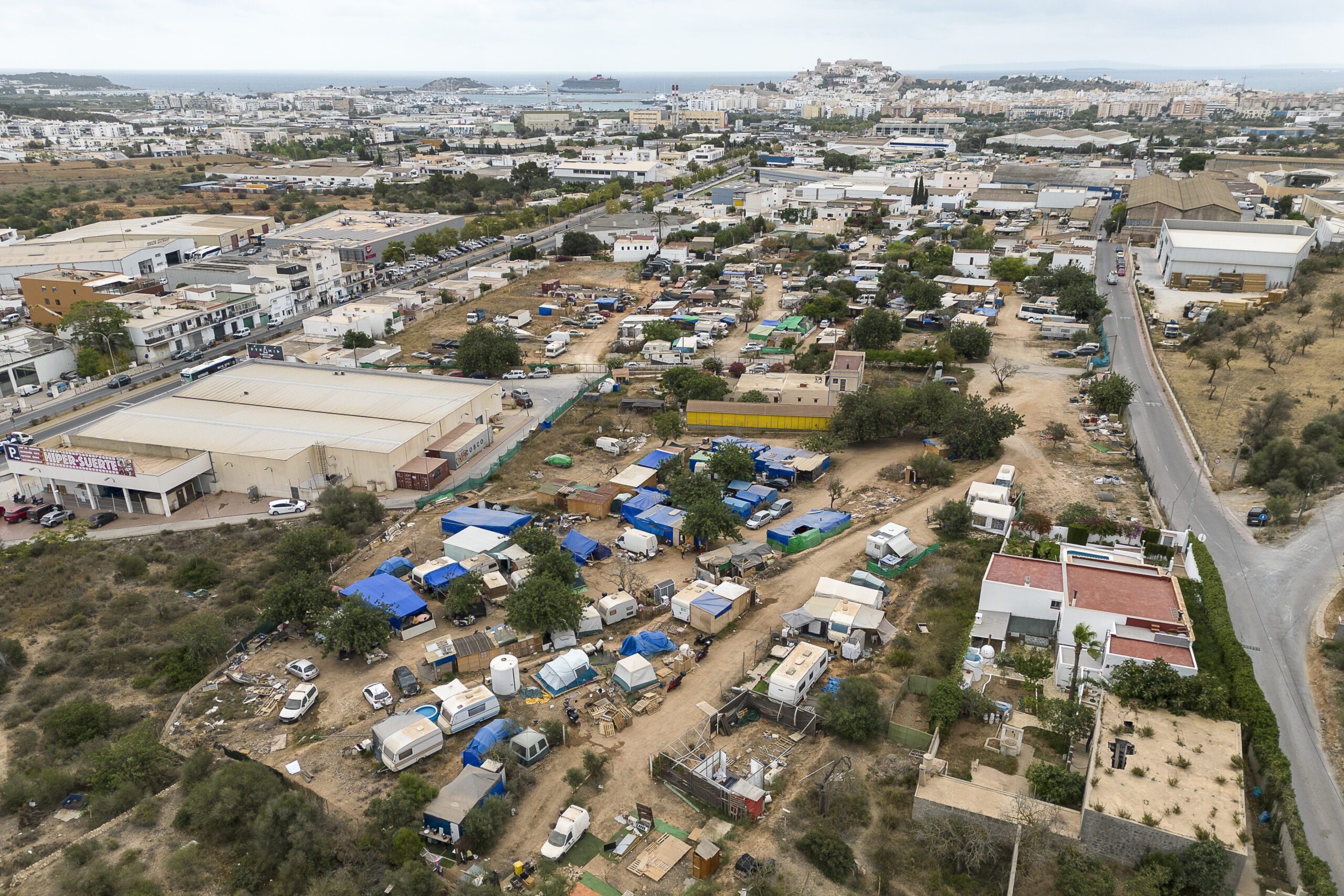 On luxurious Ibiza, essential workers are forced to live in tent cities