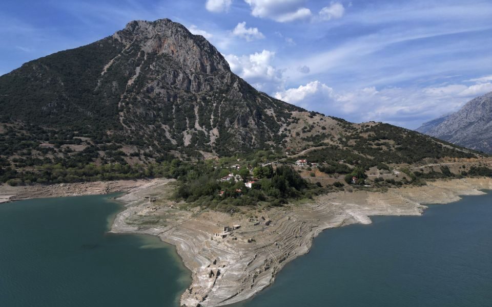 Ruins of a long-sunken village emerge as drought saps a vital reservoir