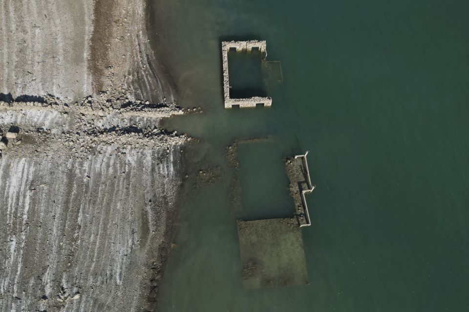 ruins-of-a-long-sunken-village-emerge-as-drought-saps-a-vital-reservoir1