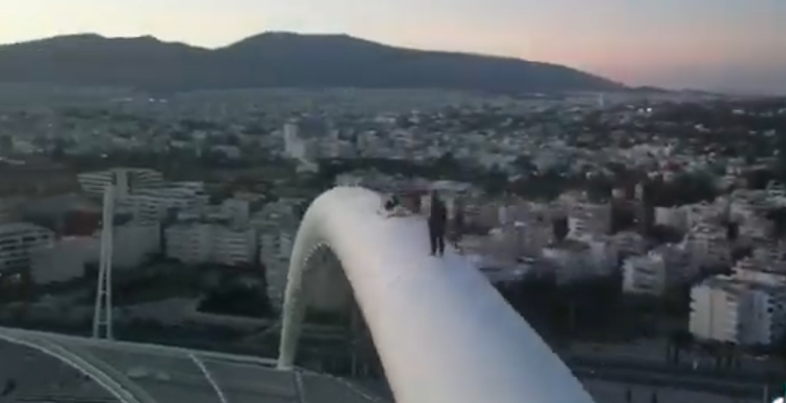 daredevils-climb-roof-of-athens-olympic-stadium1